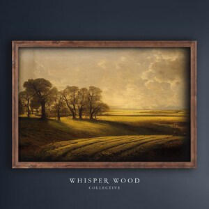 Peut inclure: Une peinture encadr&eacute;e repr&eacute;sentant un paysage rural avec un champ d'herbe verte, une ligne d'arbres et un ciel nuageux. La peinture est intitul&eacute;e "Whisper Wood Collective".