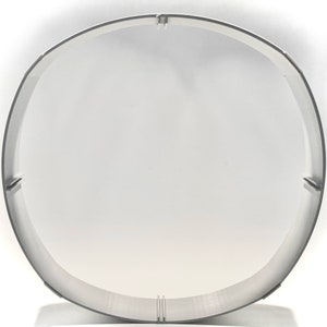 Może przedstawiać: Biały plastikowy pierścień, prawdopodobnie do ciasta lub innego wypieku.