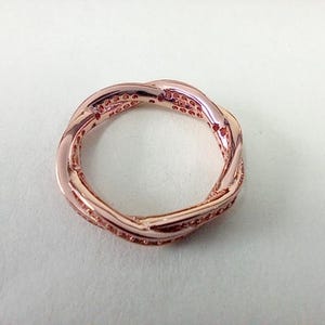 Pandora rose gold twist ring best sale