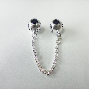 pandora silver logo safety chain charm