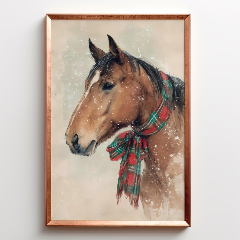 Vintage style horse wearing a red and green tartan bow with snow falling on a beige background, rustic printable farmhouse Christmas wall art.