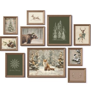 May include: A gallery wall set of ten framed prints featuring winter themes including a snow-covered pine tree, a running deer, a bear in a hat, a forest of white trees on green, a deer with a ribbon, pinecones, a snowflake with the text Winter Tidings, a fox in a snowy forest, a bird on a branch, and antlers.