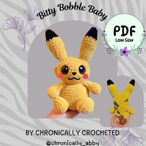 May include: A yellow crocheted plush toy with long ears tipped in black, large dark eyes, and pink circular cheeks. The text reads Spark Mouse Bitty Bobble Baby, PDF Low Sew, BY CHRONICALLY CROCHETED, and @chronically_abby. A smaller view shows the back.