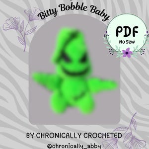 May include: A digital PDF pattern titled Buggy Man Bitty Bobble Baby by Chronically Crocheted. The document features a blurred green character with a pointed head and dark facial features, labeled as No Sew, with floral accents on a gray background.