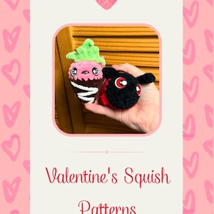May include: Valentine's Squish Patterns. Two plush toys, a pink and green strawberry and a black ladybug, are held in a hand.