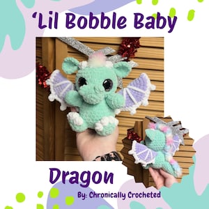 May include: A crocheted dragon toy in shades of mint green, lavender, and white. The dragon has large eyes, wings, and a fluffy crest. The text "'Lil Bobble Baby" and "Dragon" are displayed on the image, along with the maker's name.
