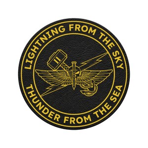 May include: A round, black patch with gold lettering and graphics. The text reads "LIGHTNING FROM THE SKY" and "THUNDER FROM THE SEA". The central graphic features a winged emblem with a sword, lightning bolt, and hammer.