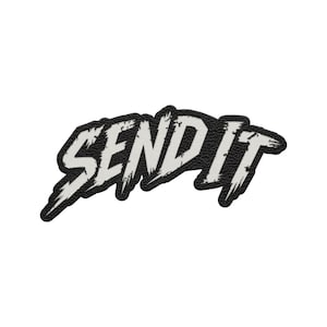 May include: A black and white patch with the words "SEND IT" in a bold, distressed font. The text is white with a textured, grunge-style effect, set against a black background. The patch has a stitched border.
