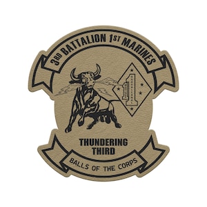 May include: Tan patch featuring the text "3rd Battalion 1st Marines" and "Thundering Third." A black bull with lightning bolts is in the center. The words "Balls of the Corps" are at the bottom.