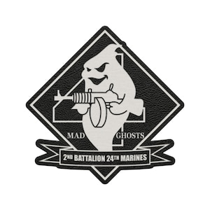 May include: A black and white patch featuring a cartoon ghost holding a machine gun. The ghost is inside a black diamond shape with the words "MAD GHOSTS" and "2ND BATTALION 24TH MARINES" in white text.
