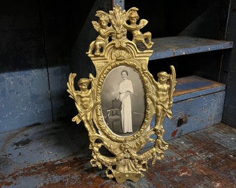 Antique / Vintage bronze / brass frame, rococo style with angel, wall hanging