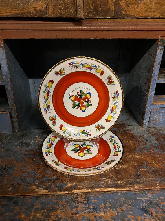 A Red Norwegian Table with Colorful Floral Painted Decoration A Red Norwegian Table with Colorful Floral Painted Decoration