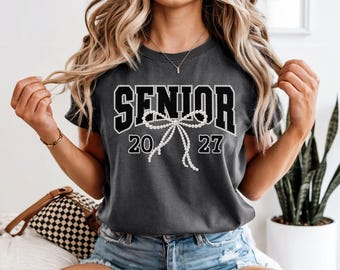 Pearl Bow Varsity Senior Graduation Shirt, Class of 2027 Comfort Colors Tee - Not Real Pearls 069-1blk