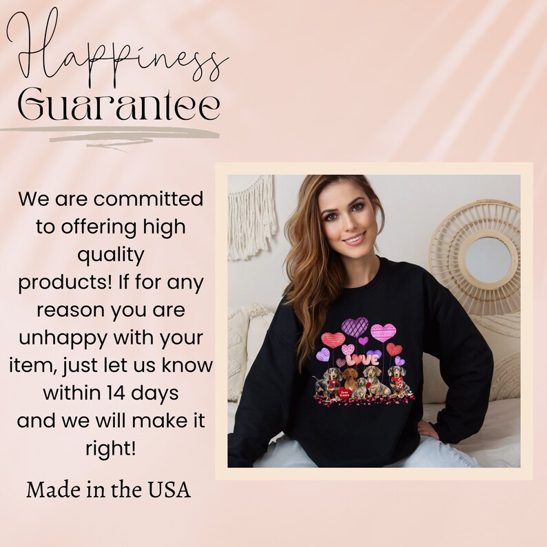 May include: Black sweatshirt with a graphic of dachshunds and hearts, and the word "Love". The image also includes the text "Happiness Guarantee", "Made in the USA", and a customer satisfaction statement.