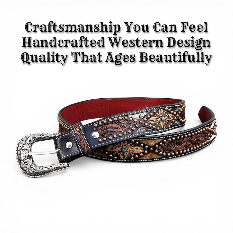 May include: A handcrafted Western-style belt with a silver buckle. The belt features floral and leaf patterns, copper-colored studs, and turquoise accents. The belt has a black leather base with brown and tan details.