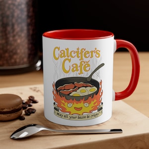 Howl&#39;s Umzugsschloss inspiriert Calcifer&#39;s Cafe Akzent Kaffeetasse, 11 Unze