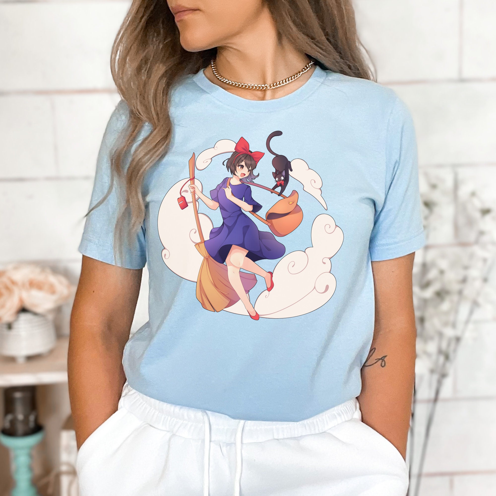 魔女の宅急便をモチーフにしたキキとジジのシャツ - Etsy 日本