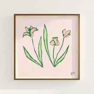 a painting of pink flowers on a white wall