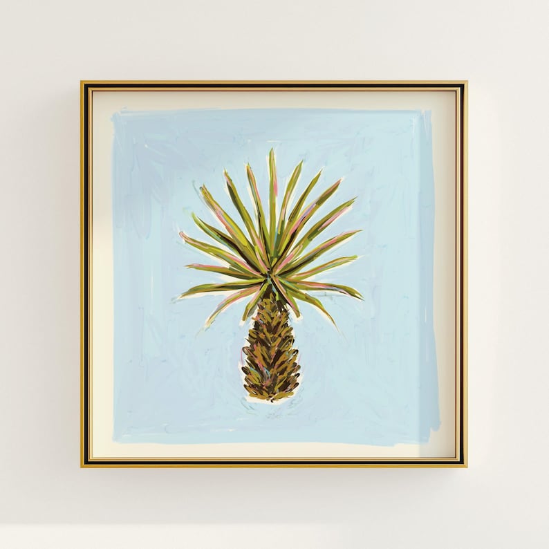a painting of a pineapple hanging on a wall