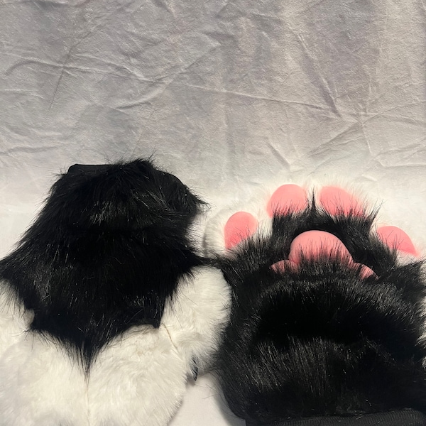Black furry paws