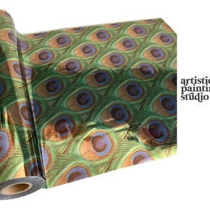 May include: A roll of decorative paper featuring a peacock feather pattern. The design includes green, brown, and blue hues. The text "artistic painting studio" is visible in the image.