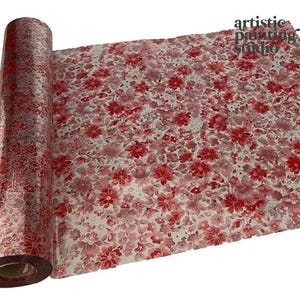 May include: A roll of floral patterned paper with a red and white design. The paper is covered in a repeating pattern of red flowers and leaves. The words "artistic painting studio" are in the upper right corner.