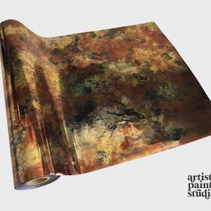 May include: A roll of decorative paper with a mottled pattern in shades of brown, gold, and black. The paper has a glossy finish and is partially unrolled, revealing the roll's core. The logo for Artistic Painting Studio is in the bottom right corner.