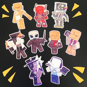 May include: A collection of nine colorful, geometric character stickers with various designs. The characters have blocky bodies and feature different outfits and accessories, including a robot, a skeleton, and a character with a crown. Yellow starbursts are in the background.
