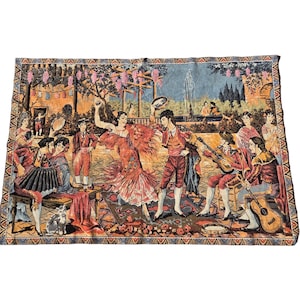 May include: Tapestry depicting a lively outdoor scene with dancers, musicians, and a fountain. The dancers wear red and orange dresses, while the musicians play guitars and accordions. The tapestry has a detailed border and a vintage aesthetic.