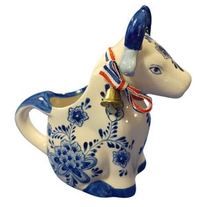 Vintage Hand-Painted Delft Blue Dutch Cow With Horns Creamer Pitcher W/ Windmill Floral Design With Ribbon Collar and Brass Bell