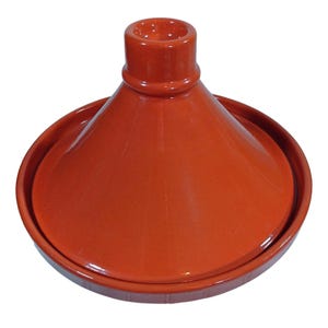 May include: A red-orange ceramic tagine pot with a conical lid and a wide, shallow base. The lid has a cylindrical handle at the top. The tagine is designed for slow cooking and is often used in North African cuisine.