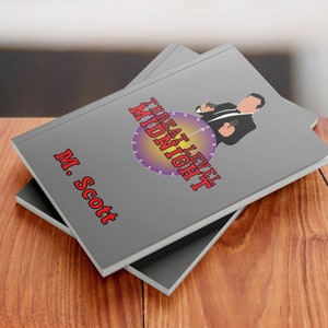 May include: Two grey books are stacked on a wooden surface. The top book features the title "TREAT LEVEL MIDNIGHT" in red and a graphic of a man in a suit. The author's name, "M. Scott," is also in red.