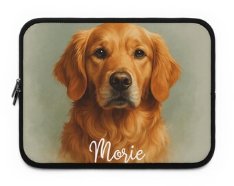 May include: A laptop sleeve featuring a detailed illustration of a Golden Retriever dog with a soft, golden-brown coat. The dog's name, "Morie," is written in cursive script. The sleeve has a black border and a zipper.