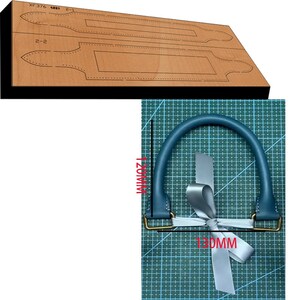 May include: A blue leather handle with gold metal hardware. The handle is 120mm tall and 130mm wide.