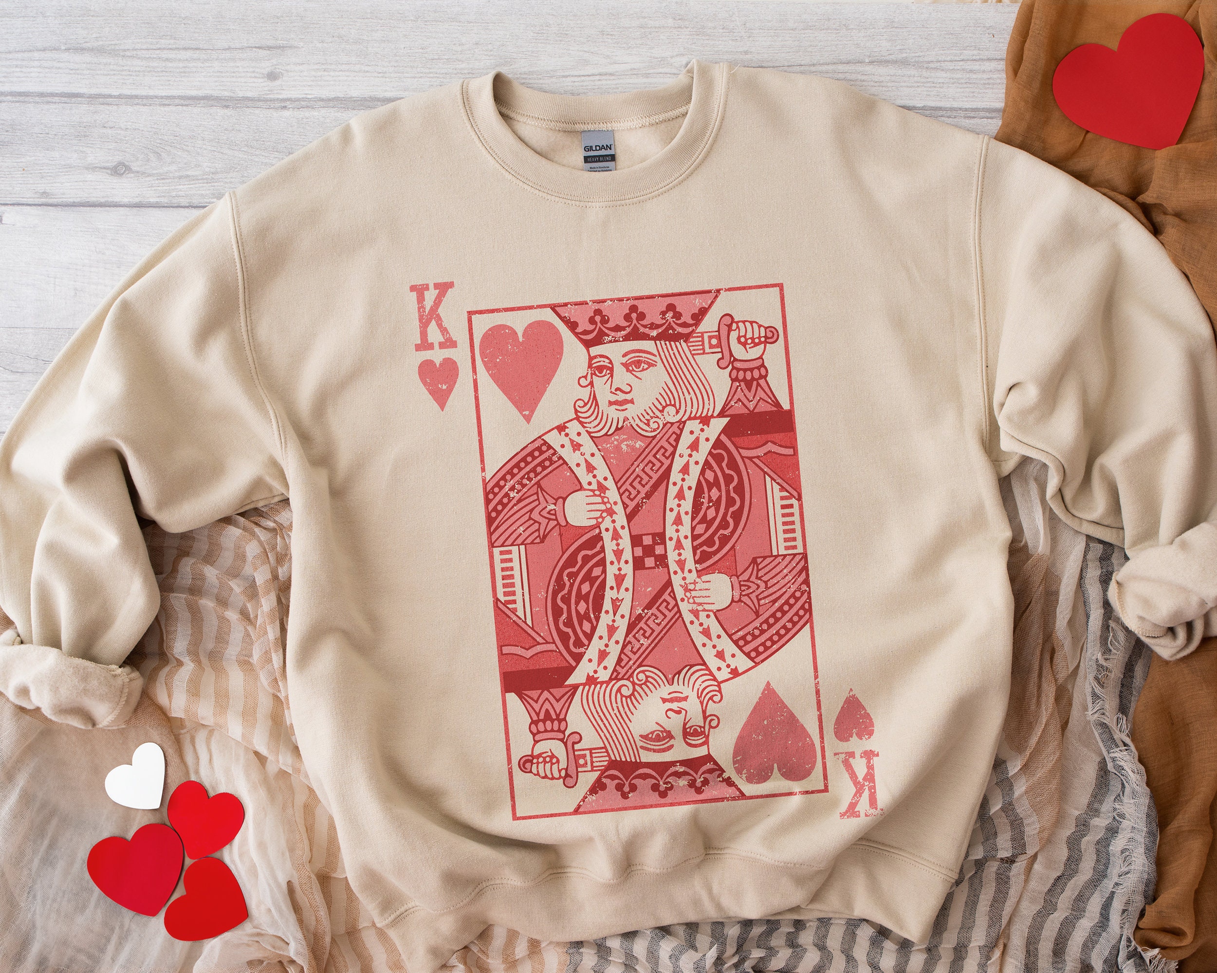 Suicide king deals sweater