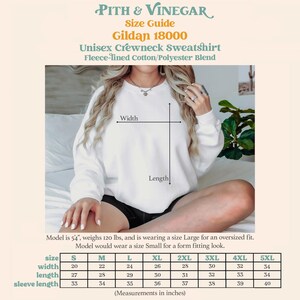 Unisex sweatshirt size chart with measurements for S–5XL.