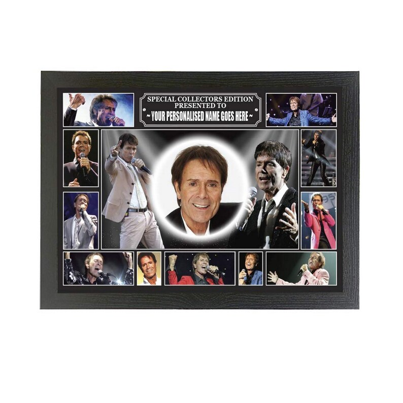 May include: A black framed collage of photos of a male singer. The photos are arranged in a grid pattern and feature the singer in various poses and settings. The collage is titled "Special Collectors Edition Presented To - Your Personalised Name Goes Here - "