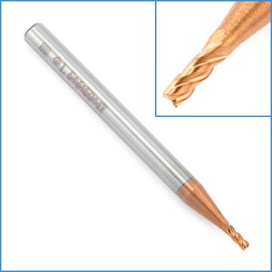May include: A silver and gold end mill with a 5/64 inch diameter and a 4 flute design. The end mill has the text "BB 0.1 5x450x4T" engraved on the side.