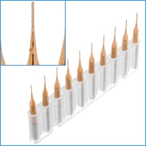 Puede incluir: Un conjunto de diez herramientas pequeñas y puntiagudas de color dorado en un soporte de plástico transparente. Las herramientas están dispuestas en una fila, con las puntas hacia arriba.