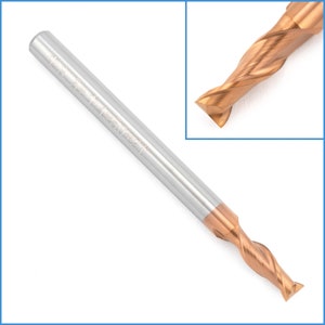 May include: A silver and gold end mill with a 4 flute design. The end mill has the text "HSS-Co 5/16x5/8x2" engraved on the side.