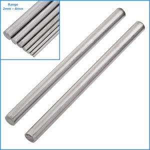 May include: Two silver metal rods, each approximately 12 inches long, with rounded ends. The rods are arranged in a parallel fashion, with one rod slightly above the other. The image includes a close-up of a set of similar rods, with the text "Range 2mm - 8mm" visible.