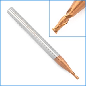 May include: A gold-colored end mill with a silver shank. The end mill has a four flute design and is 1/4 inch in diameter.