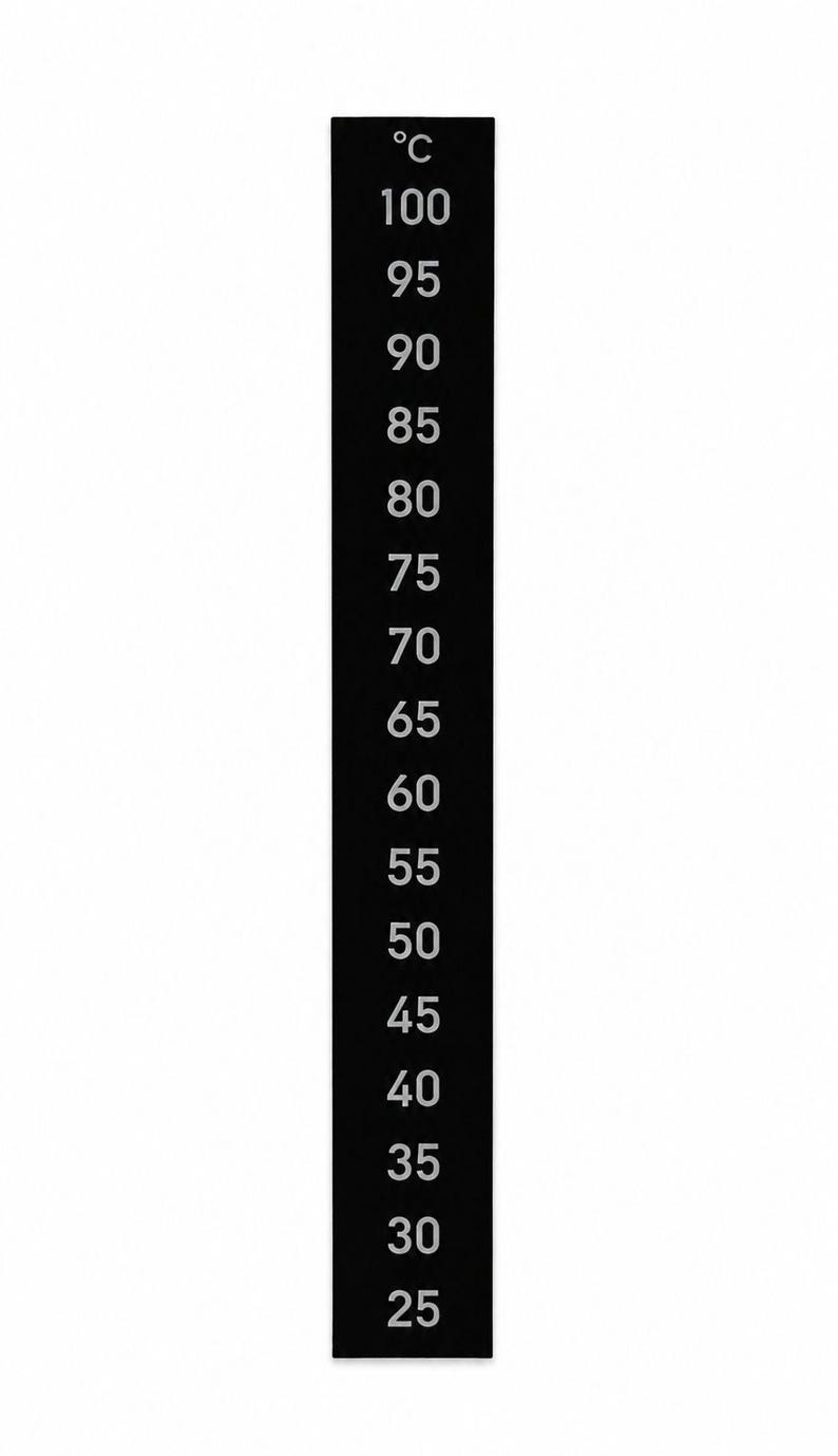 May include: A vertical black rectangular temperature strip featuring white printed numbers from 25 to 100 in increments of 5, topped with the symbol &deg;C. The design is clean and functional, displaying a clear numerical scale for temperature monitoring.
