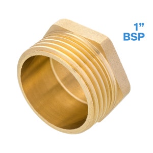 Op de afbeelding: Een messing 1" BSP pijpfitting stop. De stop is zeshoekig en heeft een schroefdraadopening.
