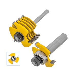 Puede incluir: Dos fresas de fresado amarillas y plateadas con un rodamiento en una de las fresas. Las fresas están diseñadas para crear un borde decorativo en la madera.