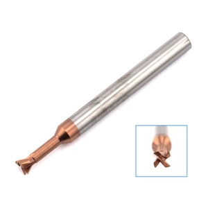 May include: A close-up of a silver and copper-colored end mill with a four-flute cutting head. The end mill is designed for machining and has a sharp, pointed tip.