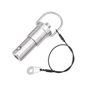 May include: A silver metal quick release pin with a loop and a black cord attached. The pin has a spring-loaded mechanism and a ball bearing.