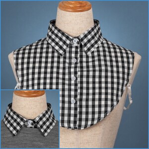 May include: A black and white gingham collar with a rounded neckline. The collar is made of a soft, lightweight fabric and is perfect for adding a touch of style to any outfit.