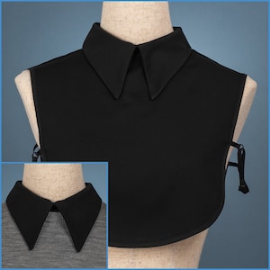 May include: A black faux collar with a pointed collar and a sleeveless design. The collar is made of a smooth fabric and has a simple, elegant look.