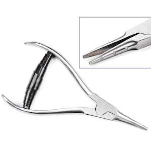 May include: Stainless steel pliers with a black adjustable handle. The pliers have a pointed tip and are designed for precision work.